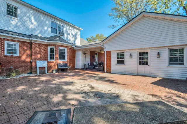 a view of a house with a patio