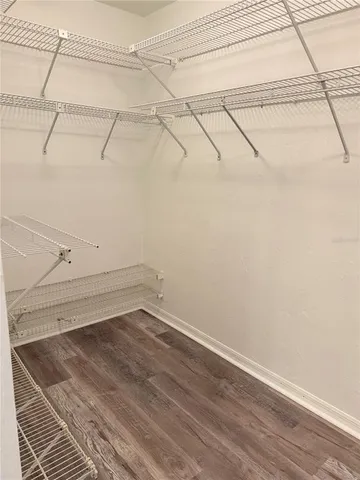 a view of a room with racks on the wall