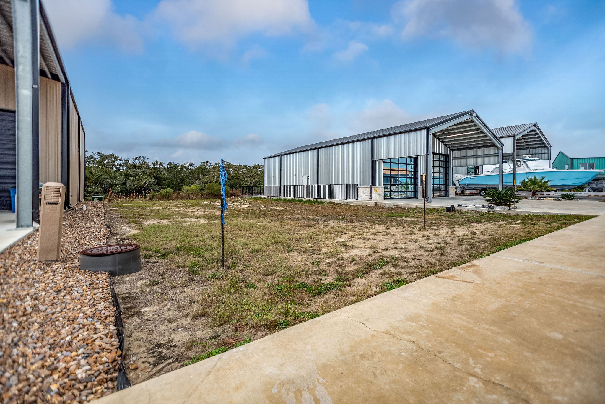 92 Cir Hook Port O'Connor, TX 77982 - Photo 2 of 10 Street view of the vacant lot located next door to 82 Circle Hook