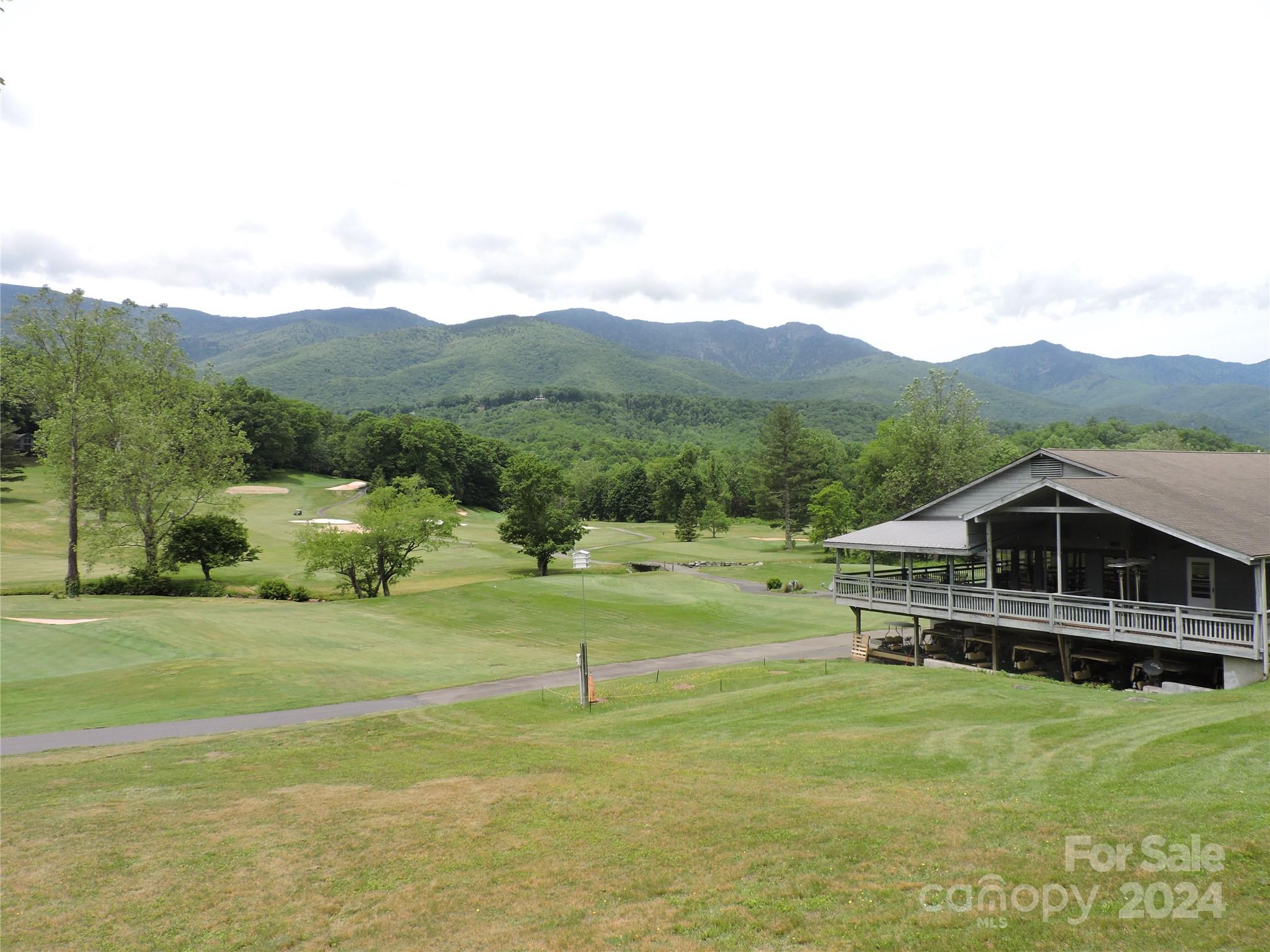0 South Toe River Road, Unit LOT 3 Burnsville, NC 28714 - Photo 21 of 28 a view of a house with a big yard