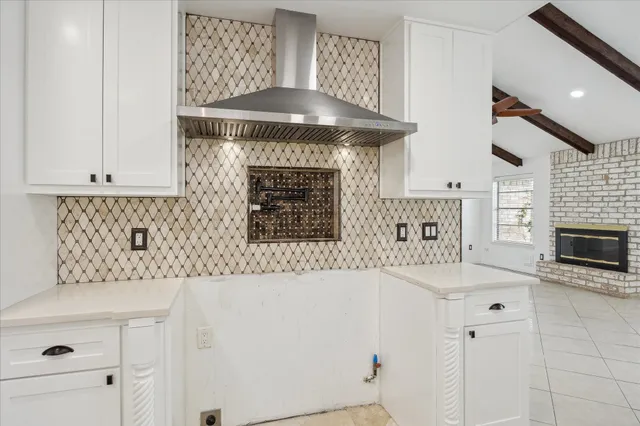 a close view of a fireplace in kitchen