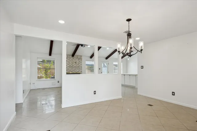 a view of a room with window and cabinet