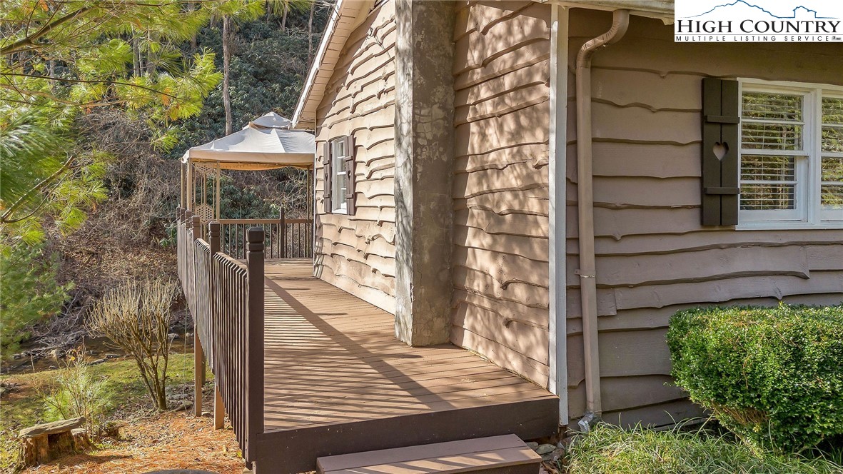 2862 Lower Nettle Knob Road West Jefferson, NC 28694 - Photo 12 of 41 a view of a pathway of a building