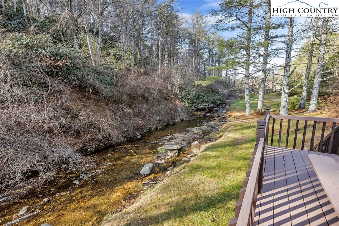 2862 Lower Nettle Knob Road West Jefferson, NC 28694 - Photo 14 of 41 a view of balcony with wooden floor and fence