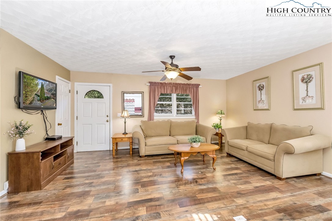 2862 Lower Nettle Knob Road West Jefferson, NC 28694 - Photo 26 of 48 a living room with furniture and a window
