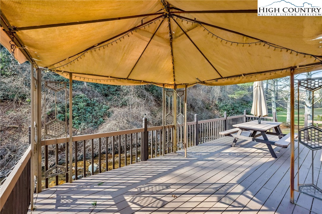 2862 Lower Nettle Knob Road West Jefferson, NC 28694 - Photo 39 of 41 a house view with a outdoor space