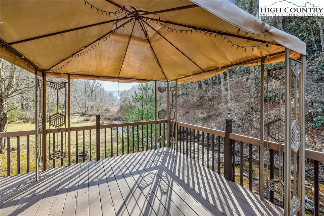 2862 Lower Nettle Knob Road West Jefferson, NC 28694 - Photo 45 of 48 a view of a two chairs on the deck