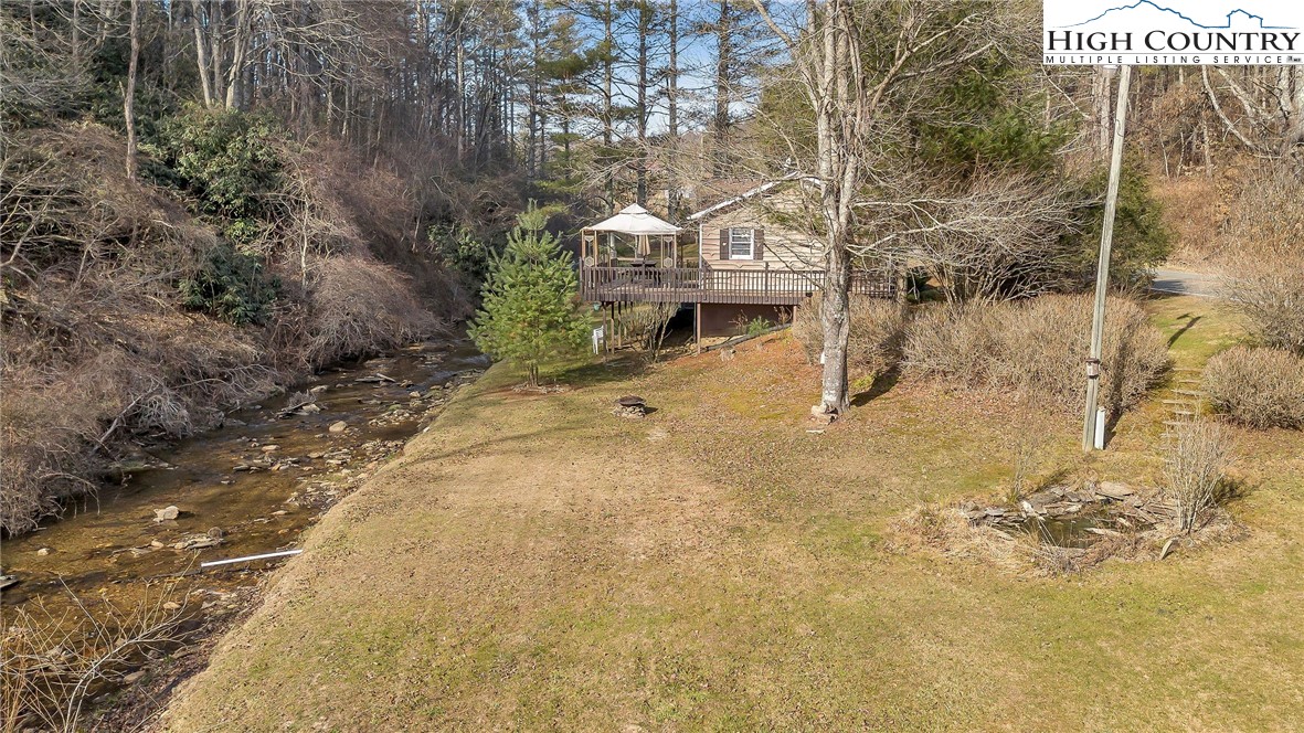 2862 Lower Nettle Knob Road West Jefferson, NC 28694 - Photo 10 of 41 a view of house with a outdoor space