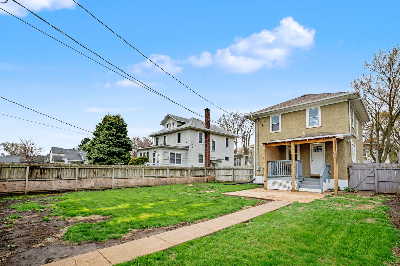 1507 Pershing Boulevard Clinton, IA 52732 - Photo 23 of 29 a view of a house with a yard porch and sitting area