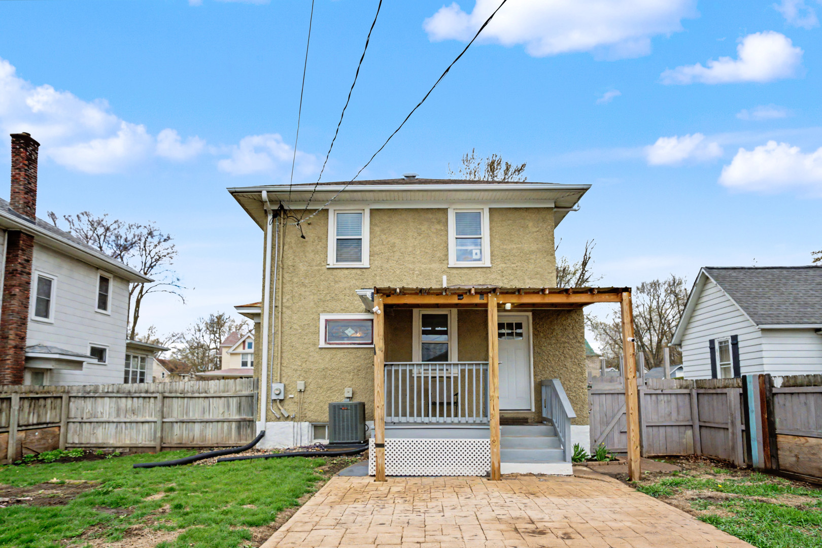 1507 Pershing Boulevard Clinton, IA 52732 - Photo 24 of 29 a front view of a house with a yard