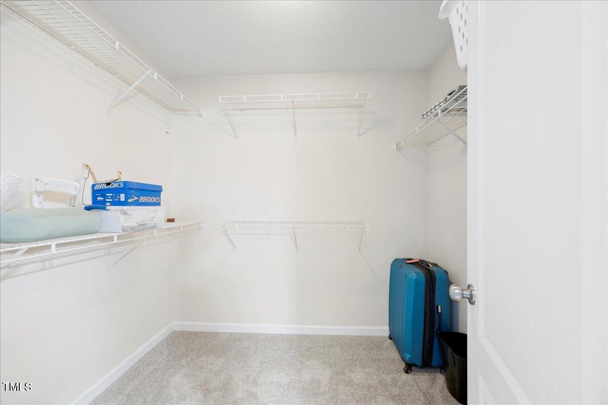 4805 Castle Crest Court Raleigh, NC 27616 - Photo 19 of 29 Owner's Walk-In Closet