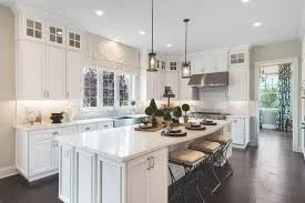 a kitchen with sink cabinets and living room