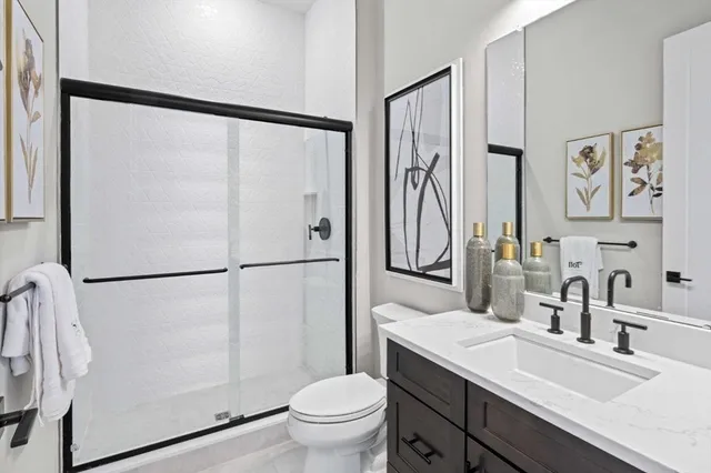 a close up of a white flower in a garden