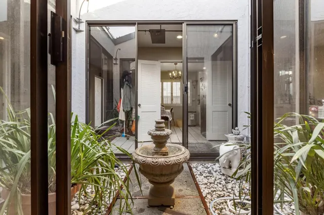 a bathroom with a bathtub and a fountain