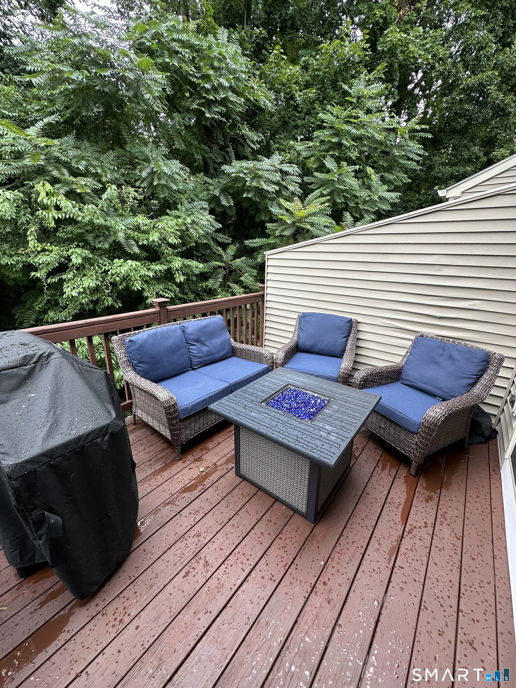 88 Quarry Dock Road, Unit 88 Branford, CT 06405 - Photo 7 of 15 Deck is accessed from the living room and primary bedroom