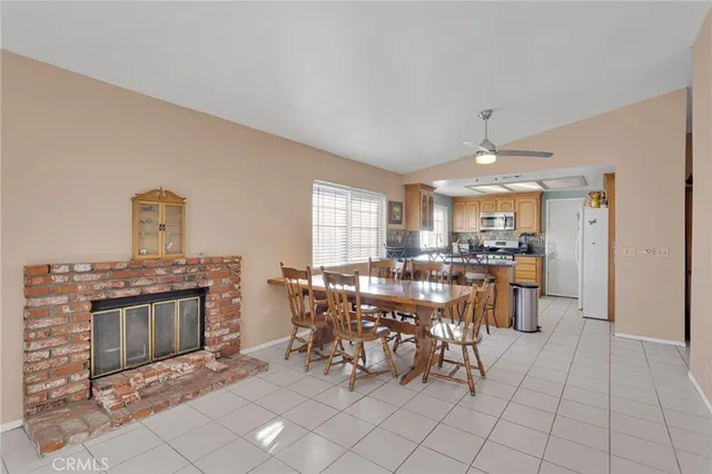 a view of a livingroom with furniture and a fireplace