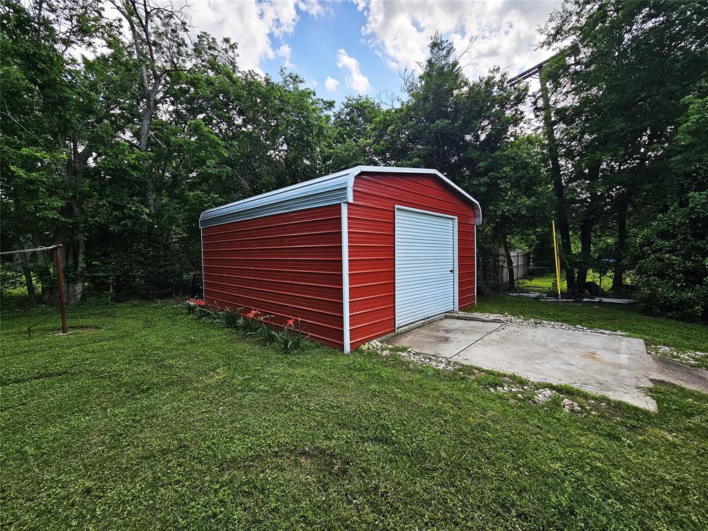 220 North Calhoun Street Groesbeck, TX 76642 - Photo 21 of 24 a view of backyard with green space