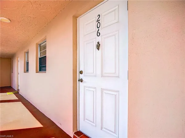 a view of a hallway with entryway