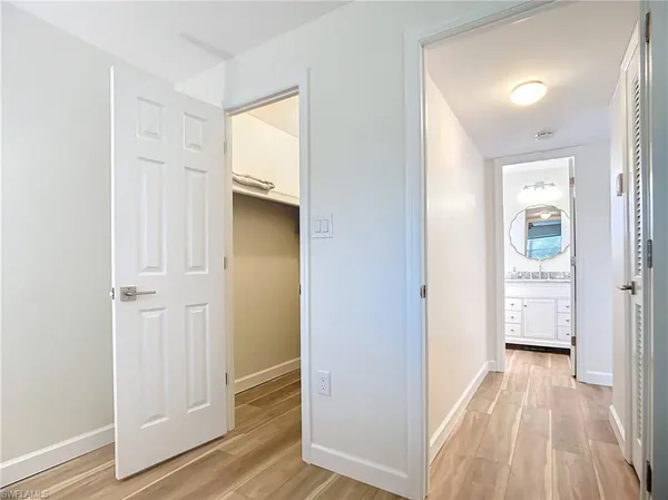 a view of a bathroom from the hallway