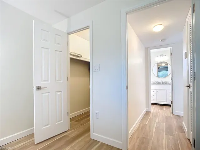 a view of a bathroom from the hallway