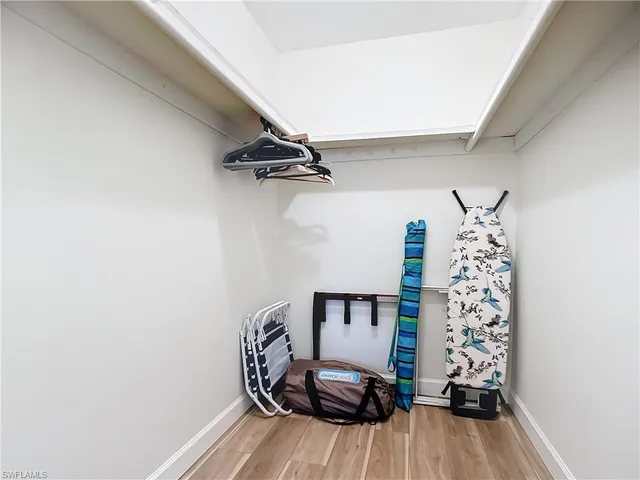 a view of a room with rack on the wall