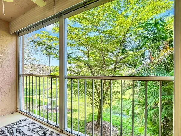 a view of a balcony with lake view