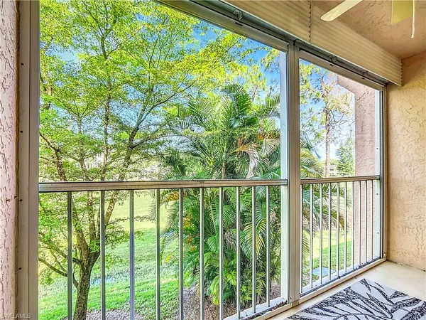 a view of a balcony with lake view