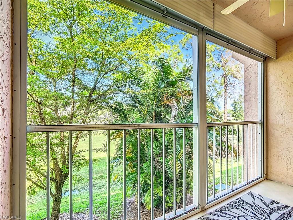 180 Turtle Lake Court, Unit 206 Naples, FL 34105 - Photo 43 of 50 a view of a balcony with lake view