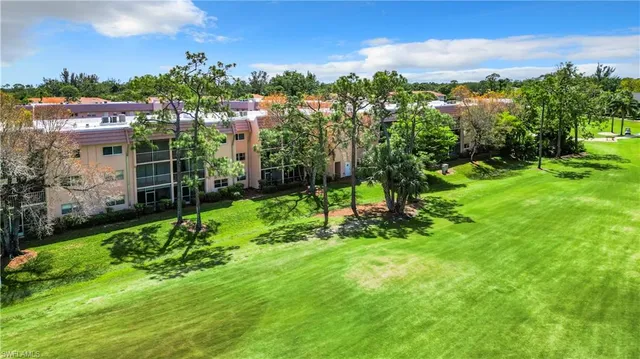 a view of a garden with a houses