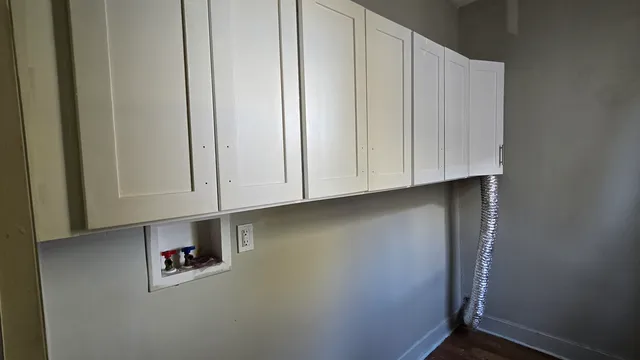 a view of room with cabinets