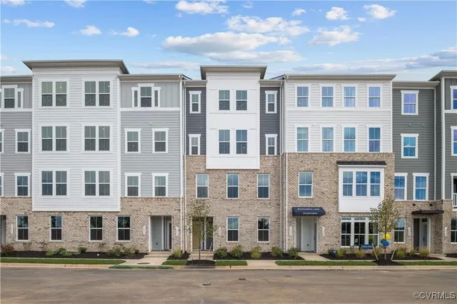 a front view of a building with street view