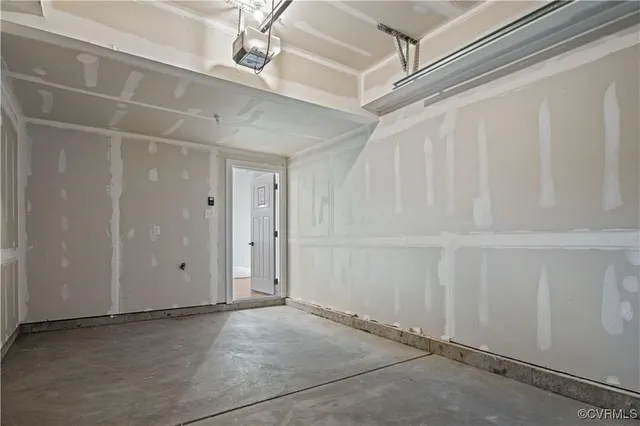 a patio area with table and chairs
