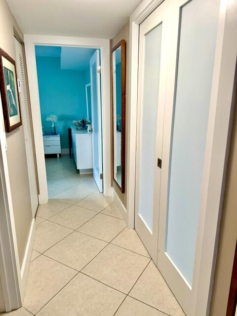 22148 Palms Way, Unit 101 Boca Raton, FL 33433 - Photo 30 of 41 Glass privacy doors!