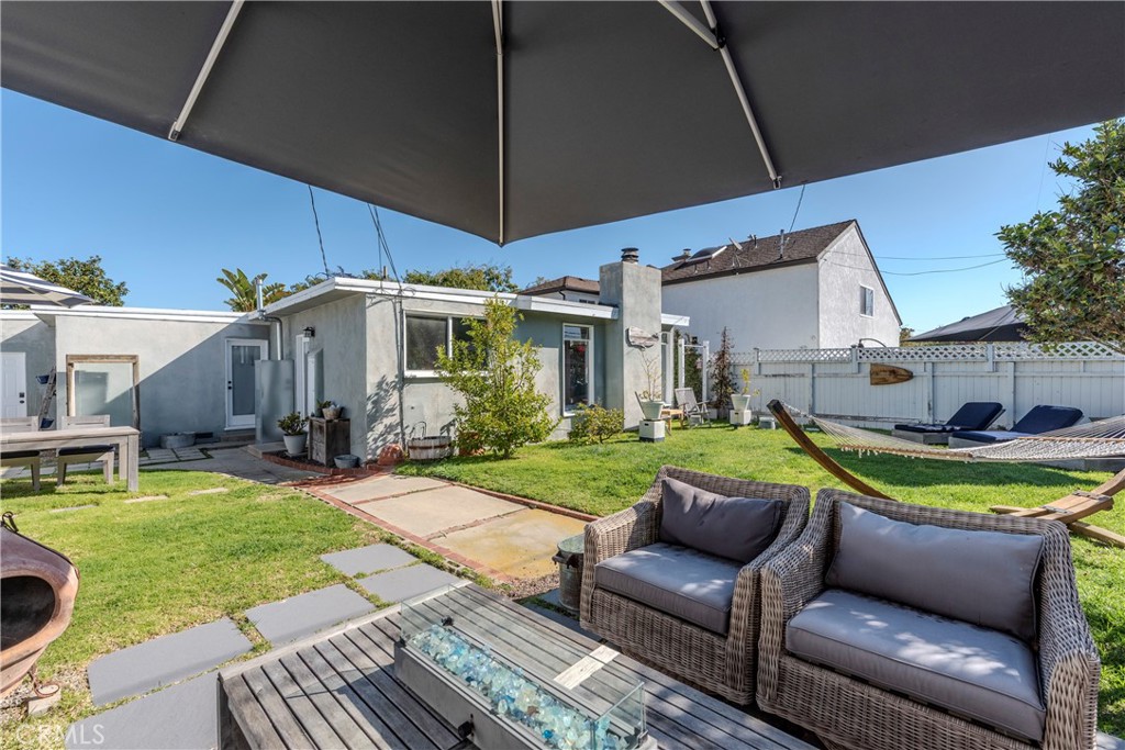 210 Vía Alameda Redondo Beach, CA 90277 - Photo 15 of 19 a view of a patio with couches chairs under an umbrella