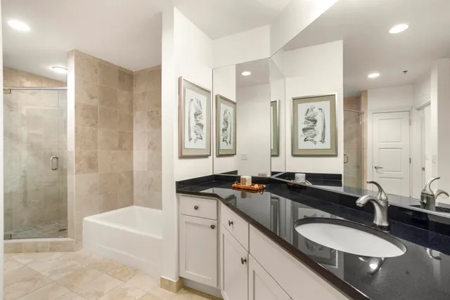 a white bath tub sitting in a bathroom