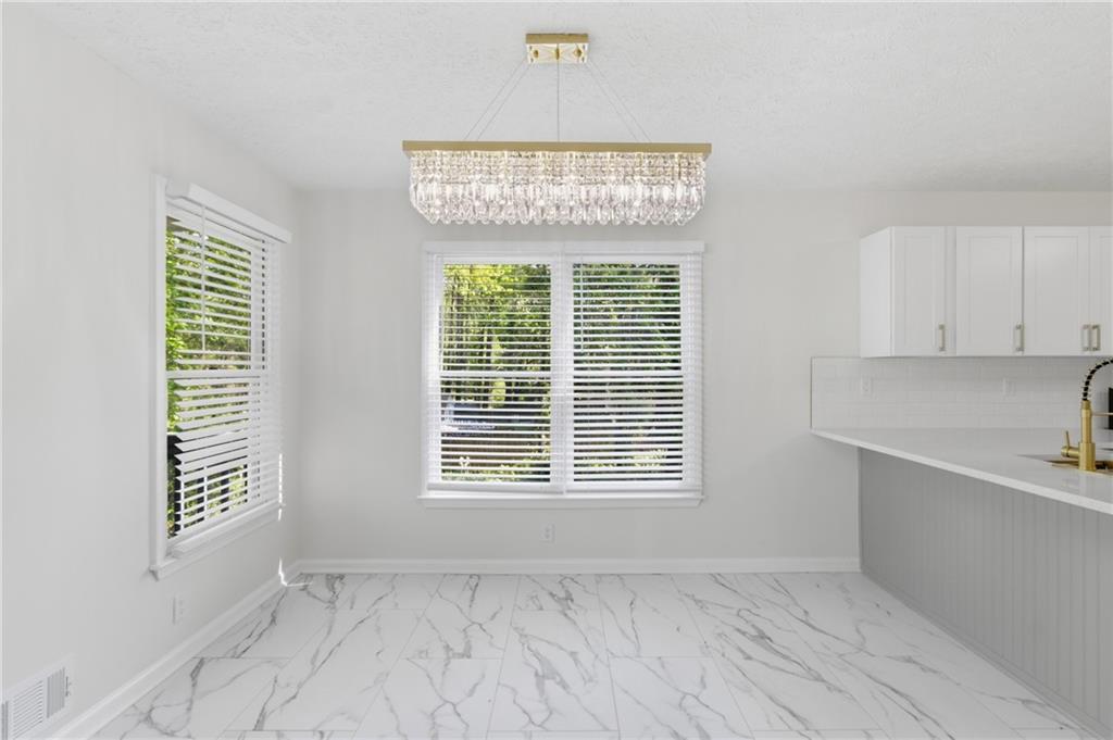 3760 Mountain Cove Road Snellville, GA 30039 - Photo 30 of 73 a view of an empty room with a window