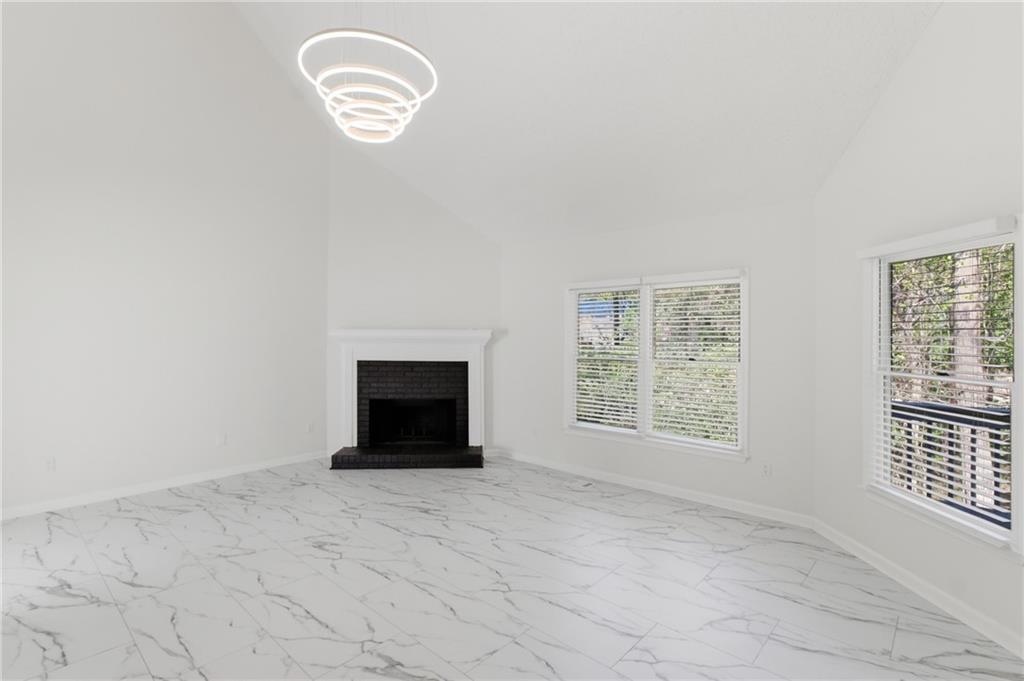 3760 Mountain Cove Road Snellville, GA 30039 - Photo 38 of 73 a view of an empty room with a window