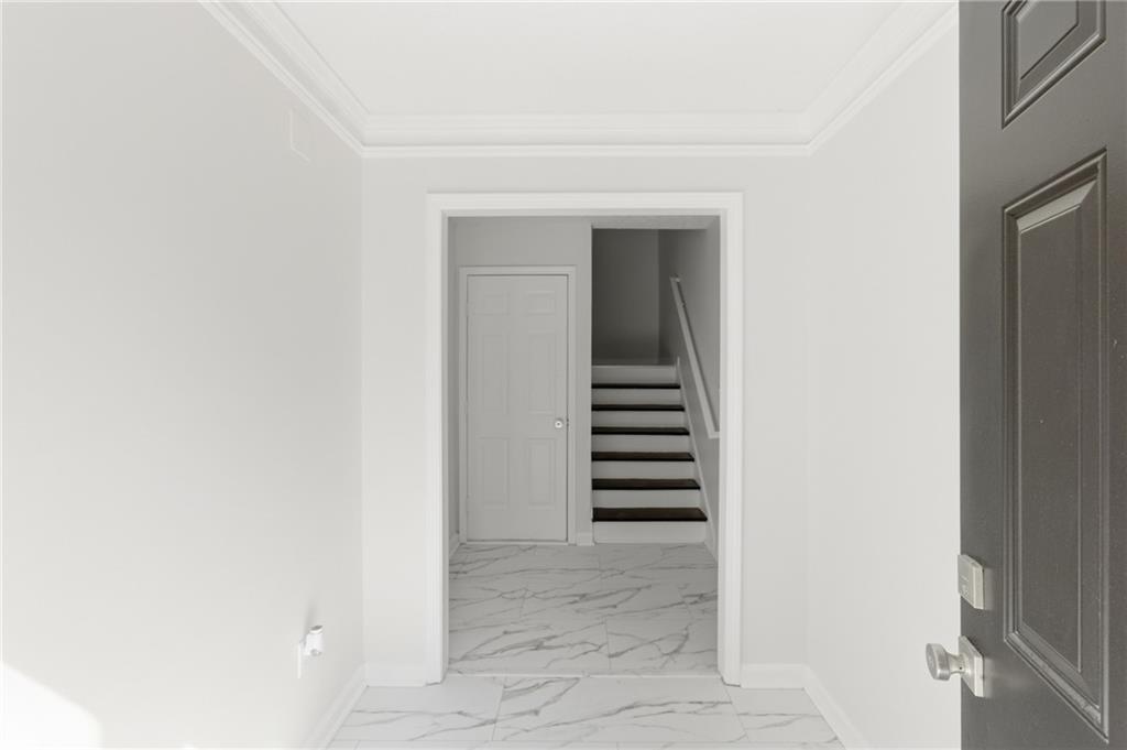 3760 Mountain Cove Road Snellville, GA 30039 - Photo 5 of 73 a view of a hallway with stairs