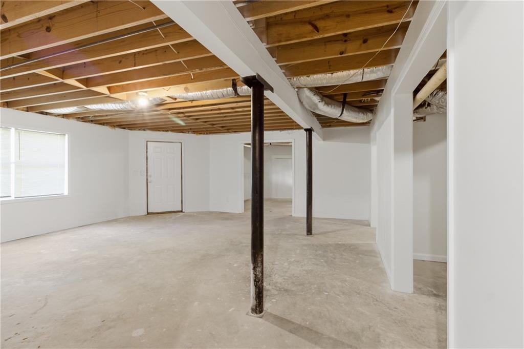 3760 Mountain Cove Road Snellville, GA 30039 - Photo 57 of 73 a view of a room with wooden floor