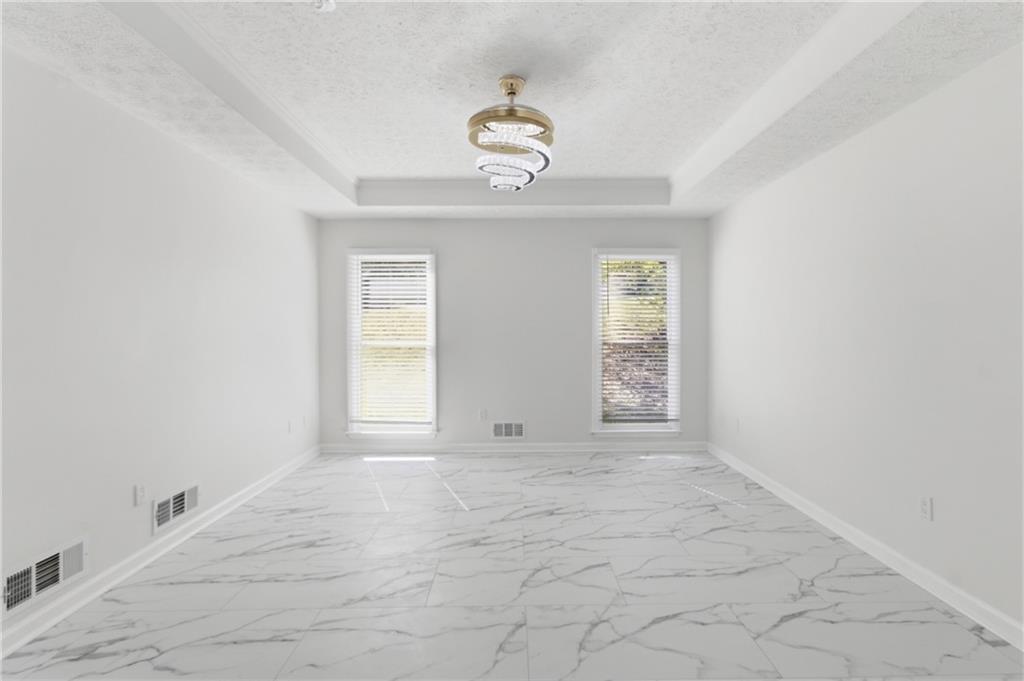 3760 Mountain Cove Road Snellville, GA 30039 - Photo 8 of 73 a view of an empty room with window