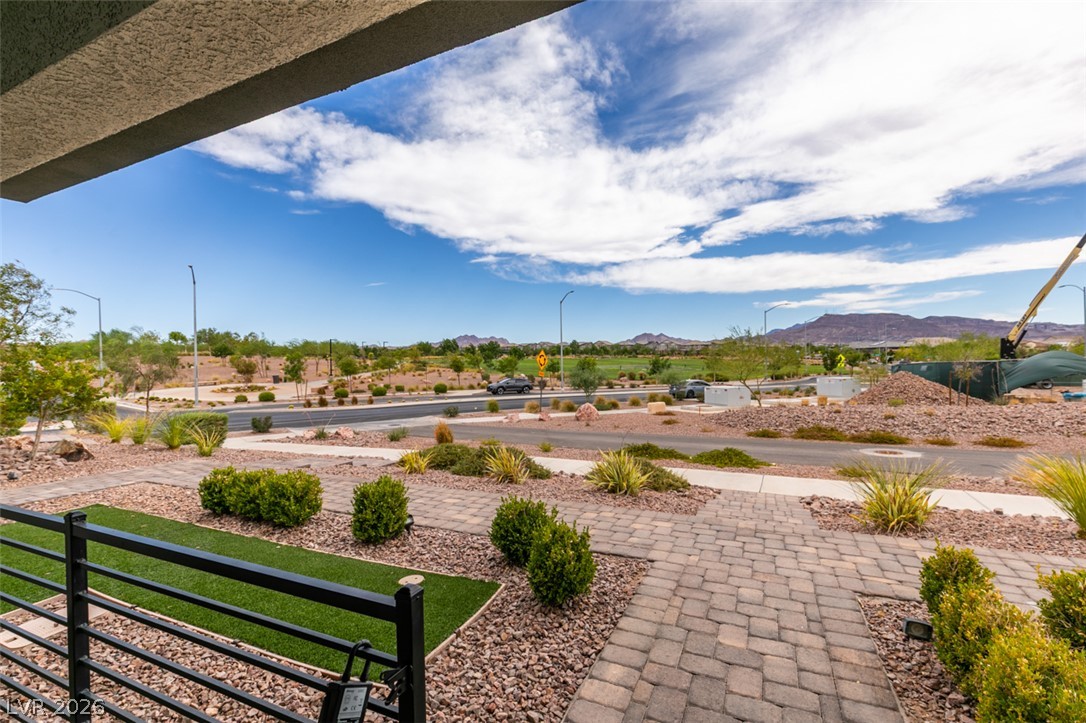 653 Pickled Pepper Place Henderson, NV 89011 - Photo 4 of 35 Vistas of the desert landscape and distant mountains provide a serene backdrop.