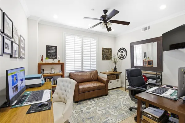 a living room with furniture or couch and a window
