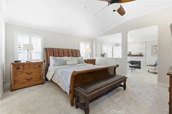 a bed room with a bed and a dresser