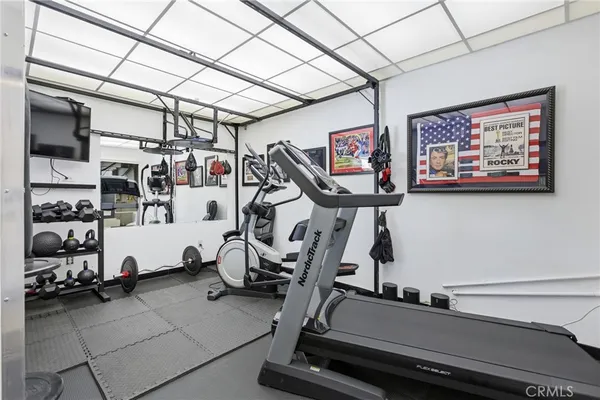 a front view of a house with garden and porch