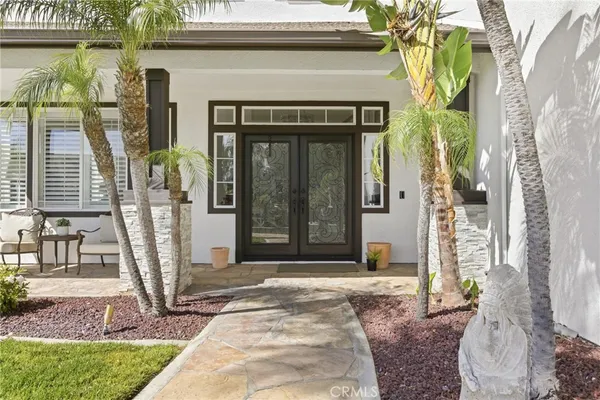 a front view of a house with a porch