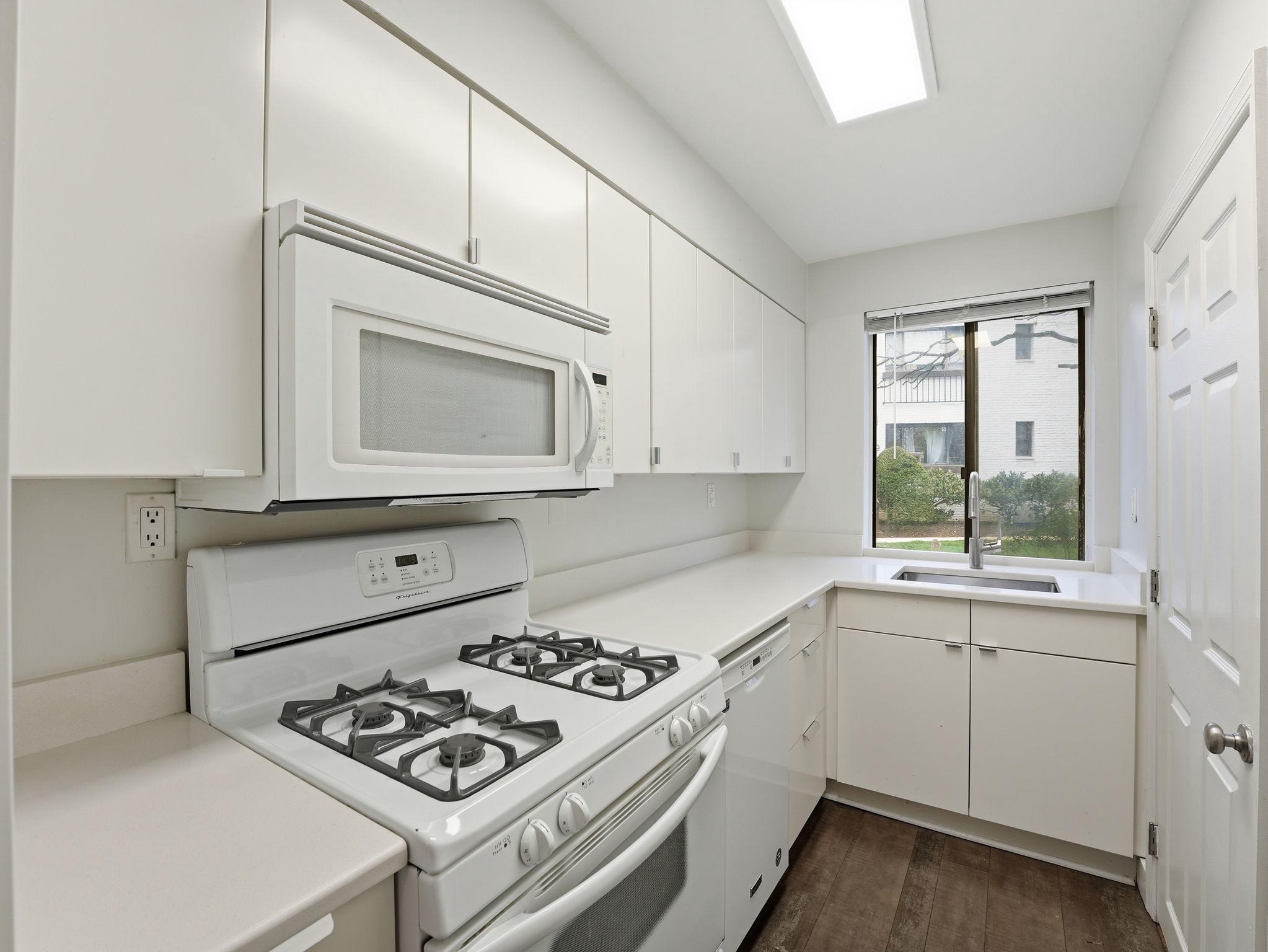 3835 Davis Place Northwest, Unit 2 Washington, DC 20007 - Photo 11 of 29 Ample storage space & counters for the home cook.