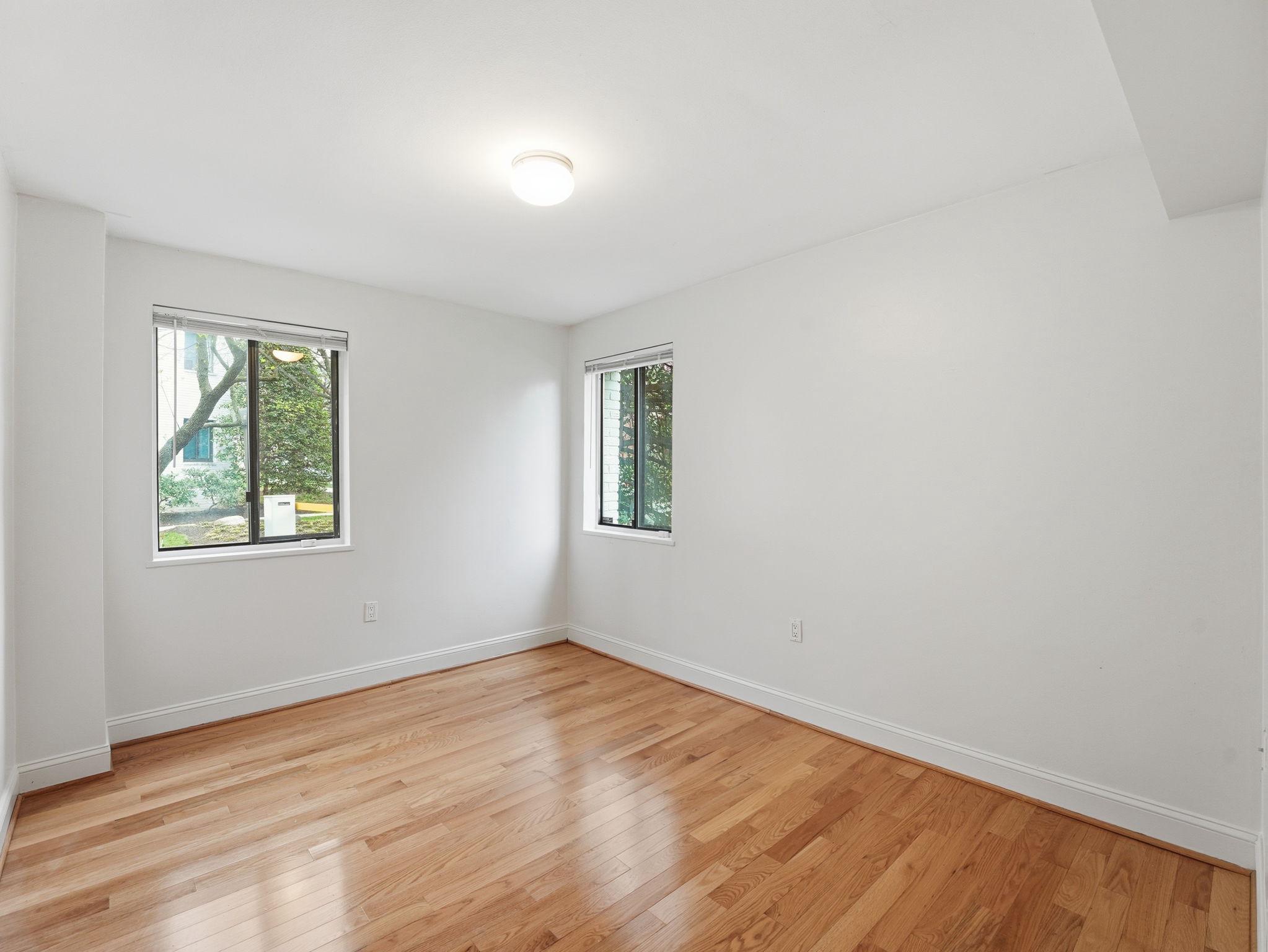 3835 Davis Place Northwest, Unit 2 Washington, DC 20007 - Photo 14 of 29 Bedroom has south and east facing windows.