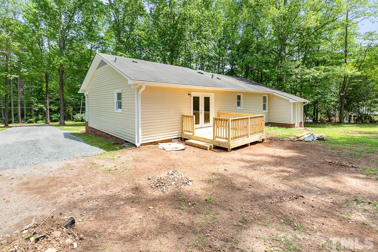 2016 Fox Ridge Road Clayton, NC 27527 - Photo 5 of 30 a view of a house with a yard and garage