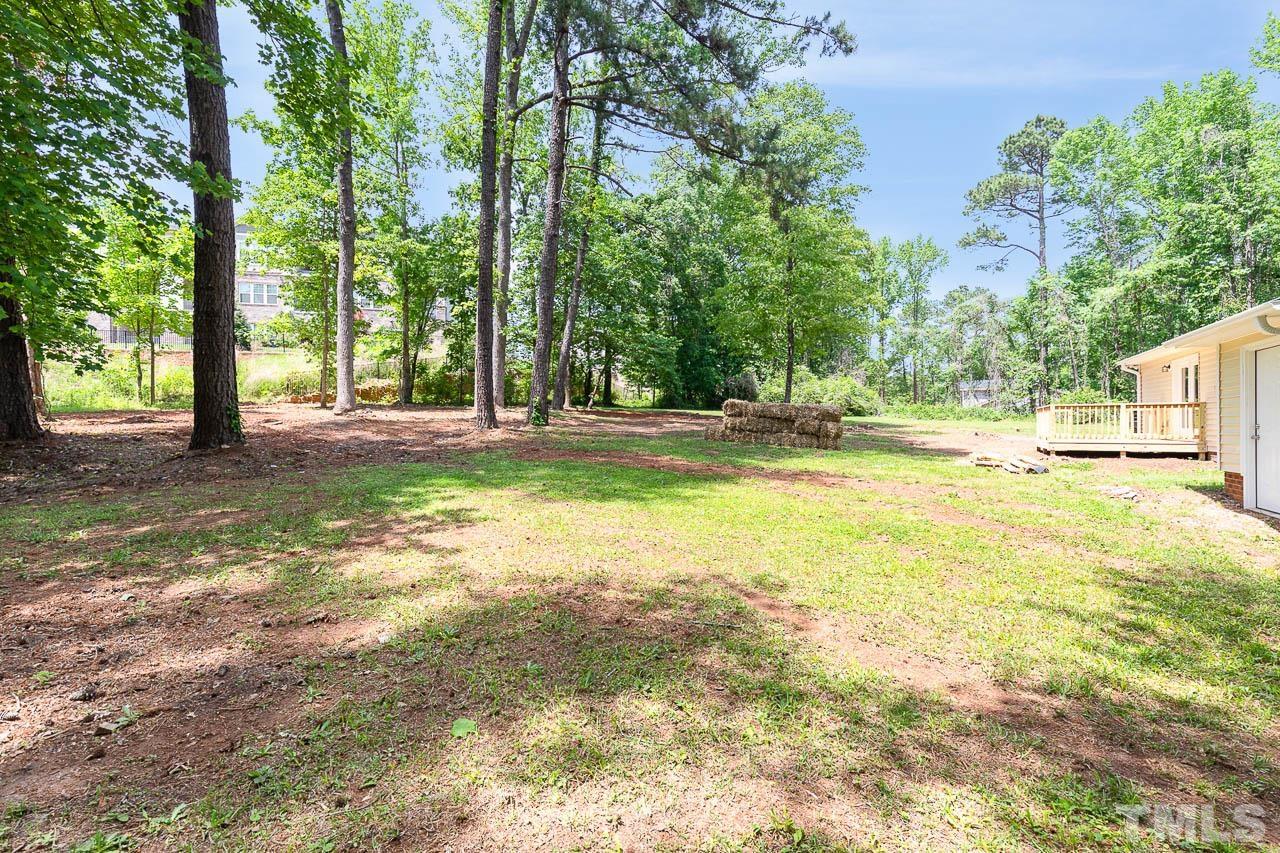 2016 Fox Ridge Road Clayton, NC 27527 - Photo 8 of 30 a view of a yard with a house and large trees