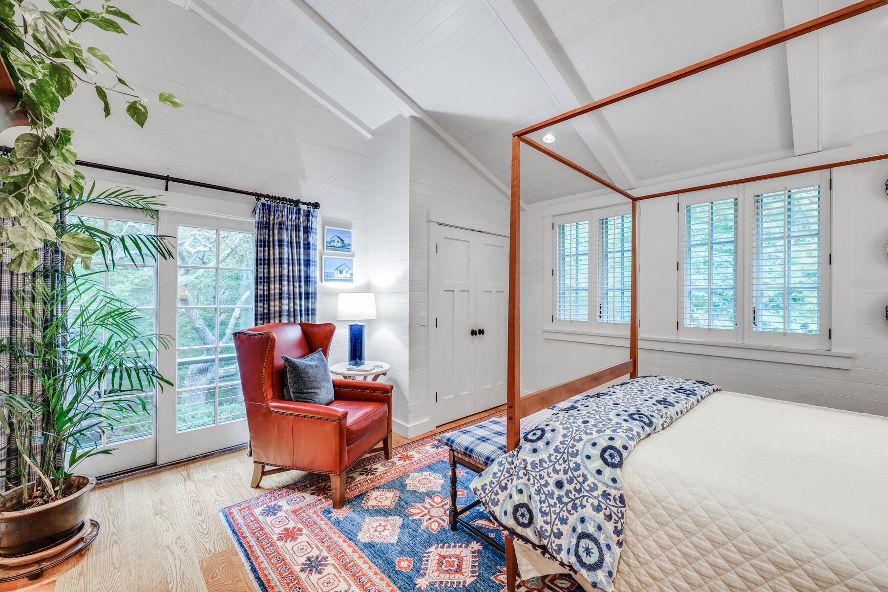 12 Somerset Road Provincetown, MA 02657 - Photo 17 of 38 a bedroom with furniture and a potted plant